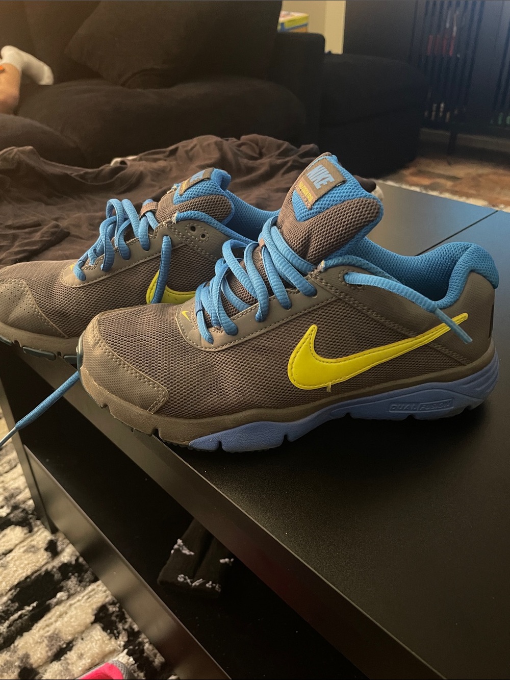 Nike Kids Gray Sneakers with Blue Lining and Yellow Swoosh